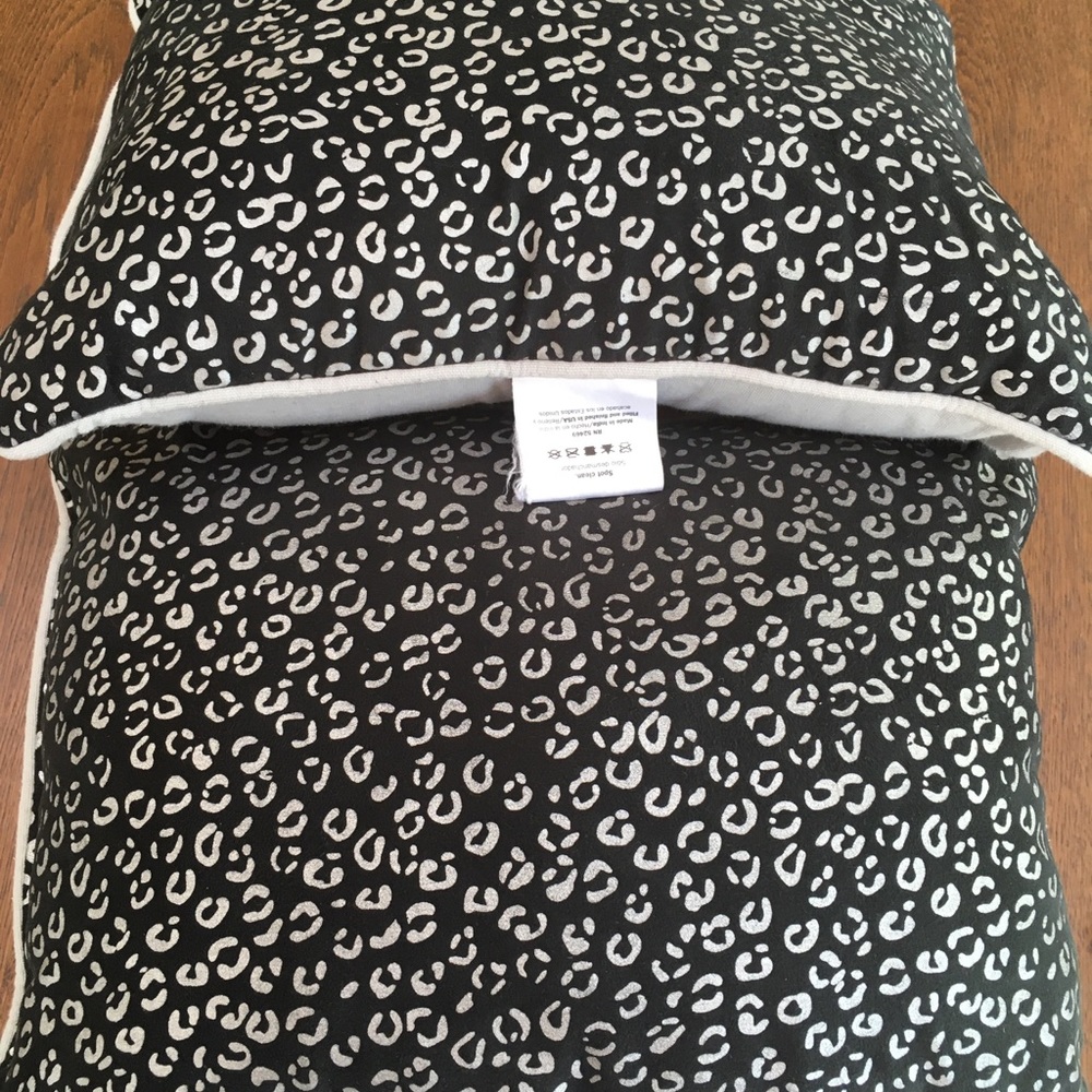 Set of Two (2) Hometrend accent pillows. Black/silver print. Gray backing.